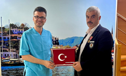 “DR. MUSTAFA ÇANKAYA’YA PLAKET”